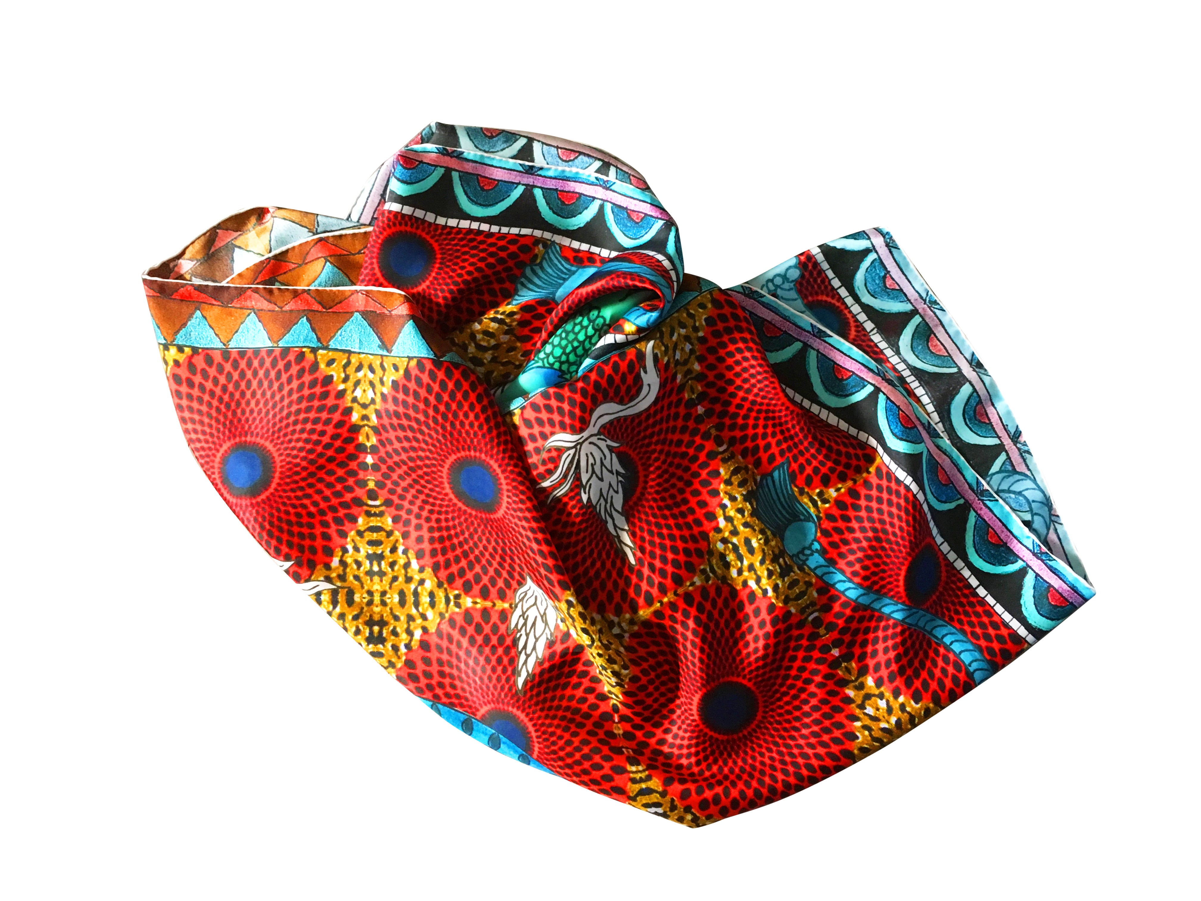 close up showing the texture of the Red 100% silk scarf printed with an eagle in the center as part of the Unique collection