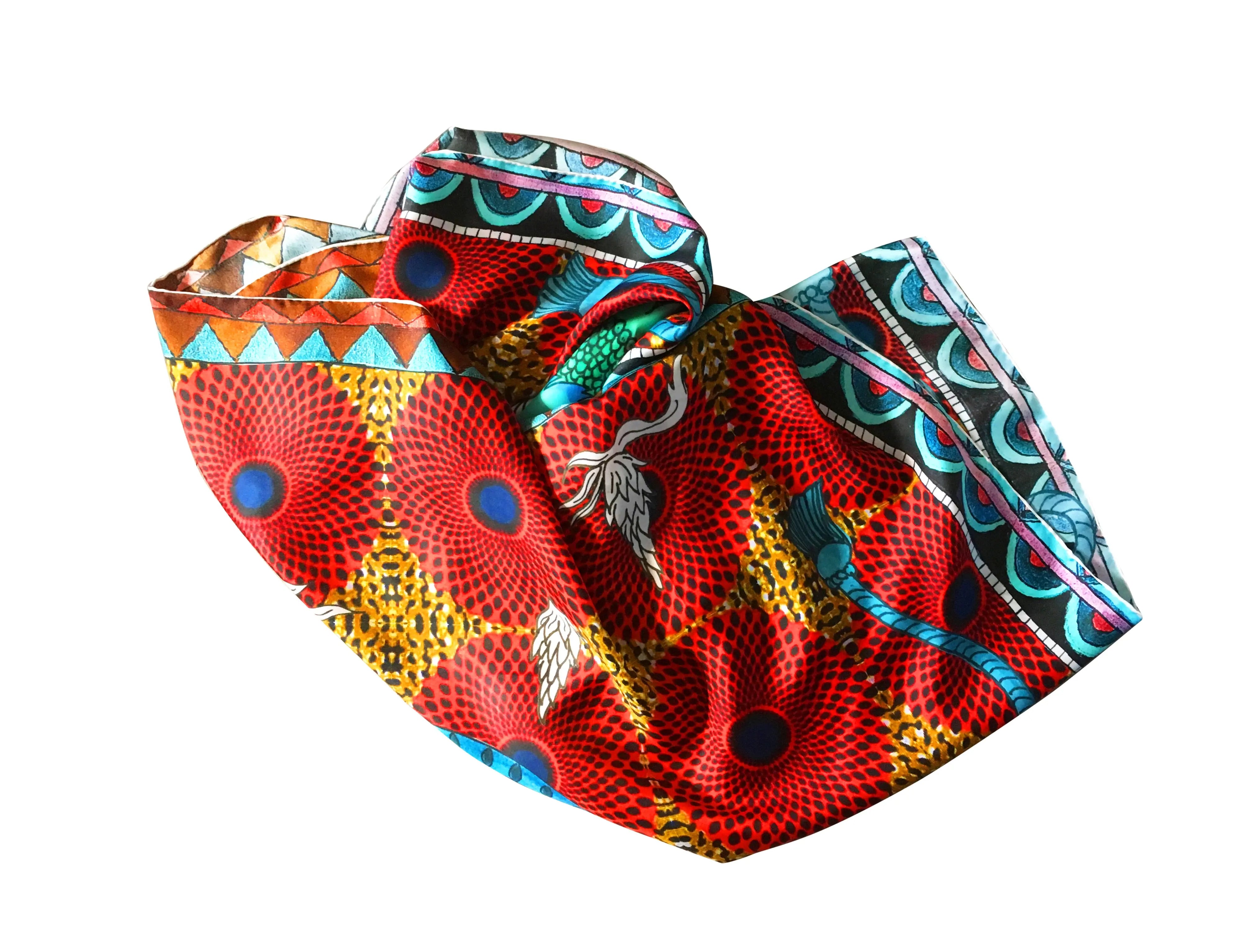 close up showing the texture of the Red 100% silk scarf printed with an eagle in the center as part of the Unique collection